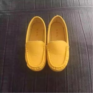 Yellow boy's shoes 9